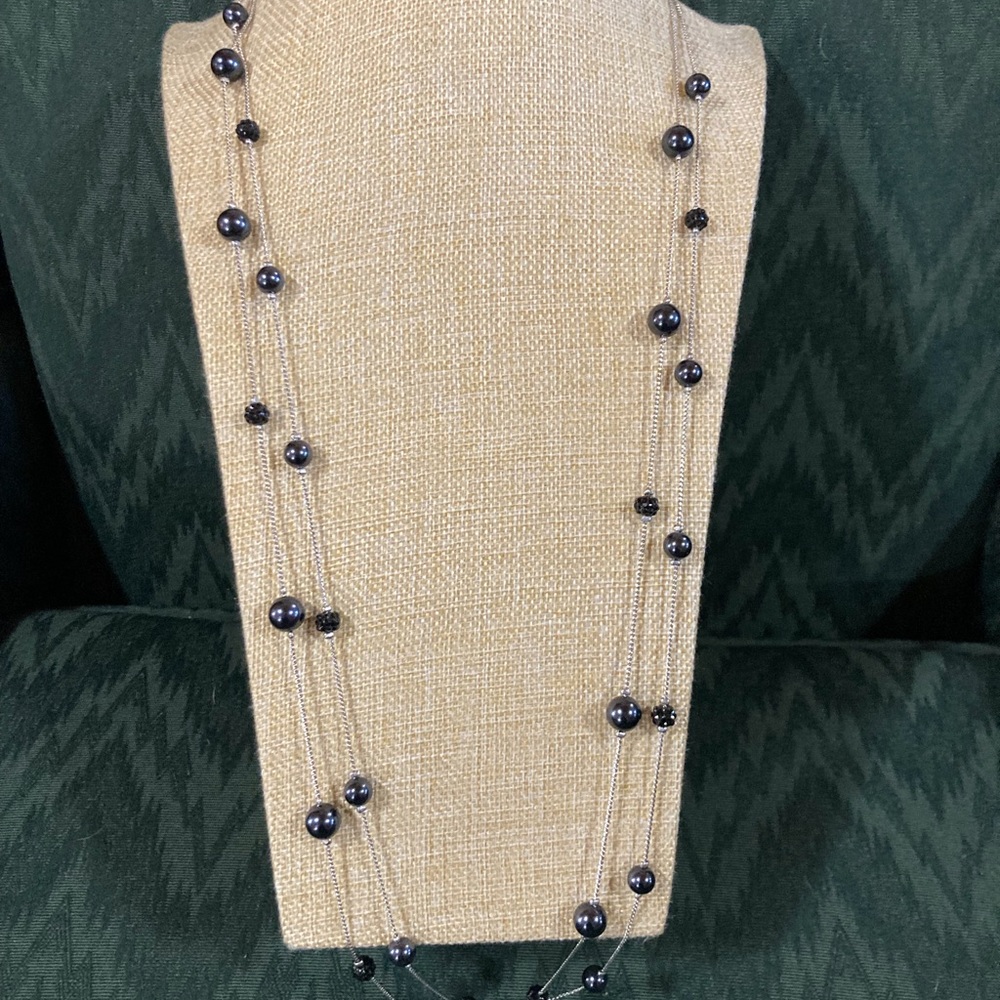Silver tone 2 strand chain with black bead & black crystal stations. Signed RMN